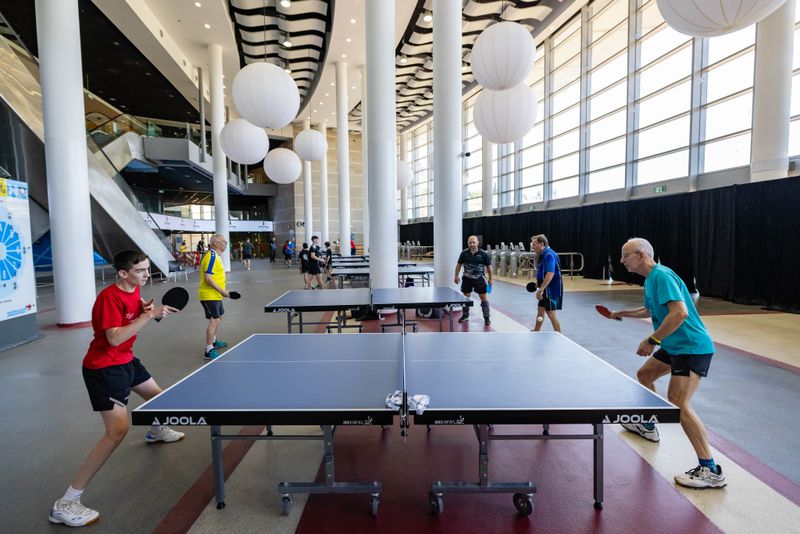 Table tennis match in a modern indoor venue